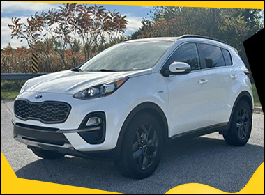 Biały Kia Sportage SUV kupiony w skupie aut